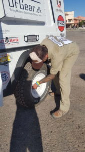 Marc Beyer checking tire pressure