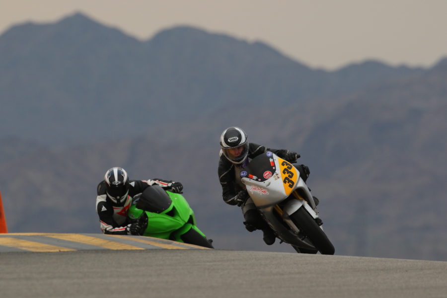 Franny Sayre coming over the rise with Lance on her tail at Chuckwalla Valley Raceway December 16-17